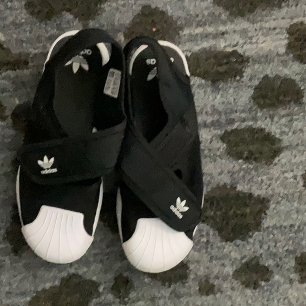 Black and white sandals.